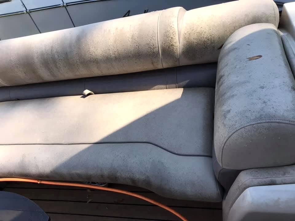 Before: stained, weathered pontoon boat seating with visible mildew spotting