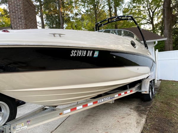 Detailed boat hull with a glossy finish on its trailer